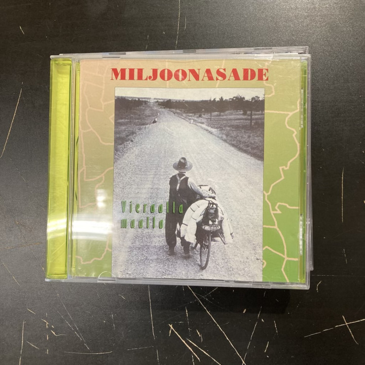 Miljoonasade - Vieraalla maalla CD (VG/VG) -pop rock-